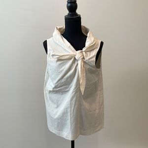 Theory brand size Lg cream colored sleeveless blouse.